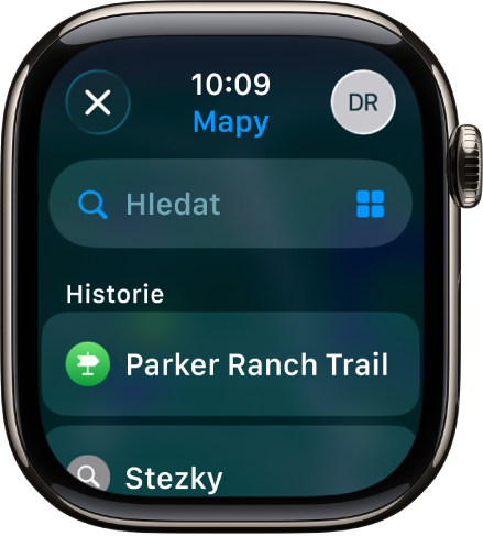 Vyhledávací obrazovka v aplikaci Mapy s vyhledávacím polem poblíž horního okraje. U dolního okraje je seznam posledních hledání