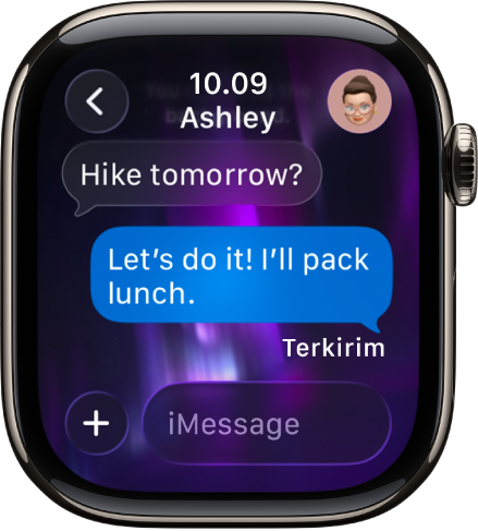 Apple Watch yang menampilkan percakapan di app Pesan.