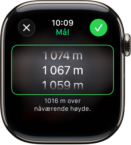 Kompass-appen viser Målhøyde-skjermen. En rullende liste over høyder vises midt på skjermen. Under listen vises en indikasjon på hvor høyt den markerte høyden er over eller den den nåværende høyden. Øverst vises knappene Lukk og Avkrysning.
