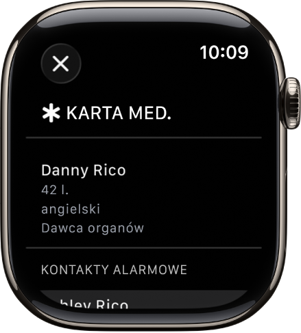 Ekran karty medycznej. Widoczne jest imię i nazwisko osoby, wiek, język, status dawcy organów oraz lista kontaktów alarmowych.