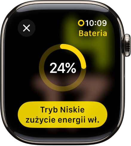 Ekran trybu Niskie zużycie energii wyświetlający częściowo wypełniony żółty pierścień wskazujący pozostały poziom naładowania. Na dole znajduje się przycisk Tryb Niskie zużycie energii.