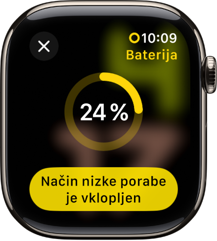 Zaslon načina nizke porabe energije z delnim rumenim obročem, ki označuje preostalo napolnjenost. Gumb za Vklop načina nizke porabe energije je na dnu.