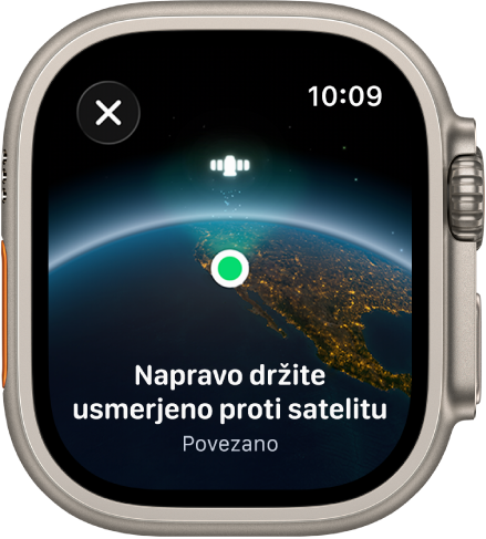 Zaslon, ki prikazuje ikono satelita nad ukrivljenim pogledom na Zemljo, zeleni indikator povezave in besedilo »Napravo držite usmerjeno proti satelitu«.