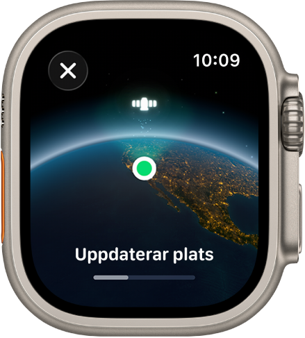 En skärm visar Uppdaterar plats med ett förloppsfält och en vy av jorden från rymden med en grön platsindikatorpunkt.