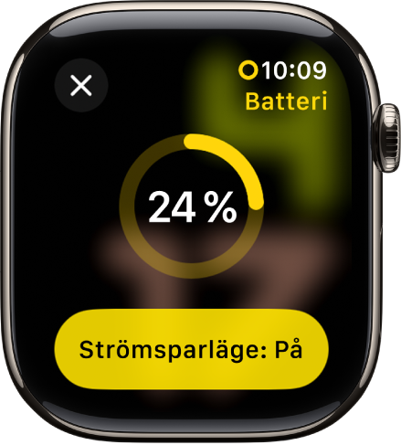 Skärmen för strömsparläge med en delvist gul ring som visar återstående laddning. Knappen för att slå strömsparläge finns längst ned.