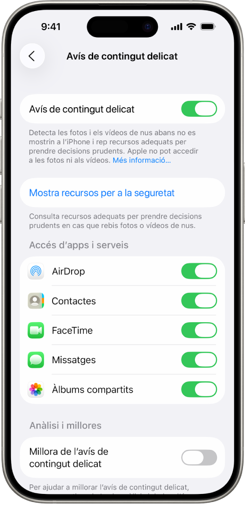 Un iPhone en què es mostra la pantalla d’avís de contingut delicat.