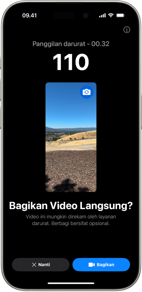 Layar Video Langsung Darurat SOS yang menampilkan panggilan darurat telepon 911 dengan pratinjau video di bagian tengah. Di bagian bawah terdapat tombol untuk Nanti dan Bagikan Video.