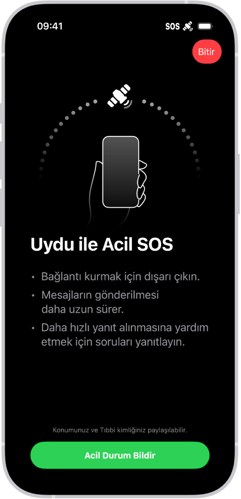 Acil SOS ekranı, telefonun bağlı ve kullanıcıyı uyduya doğru tutması konusunda yönlendirdiğini gösteriyor. Acil Durum Bildir düğmesi ekranın en altında.