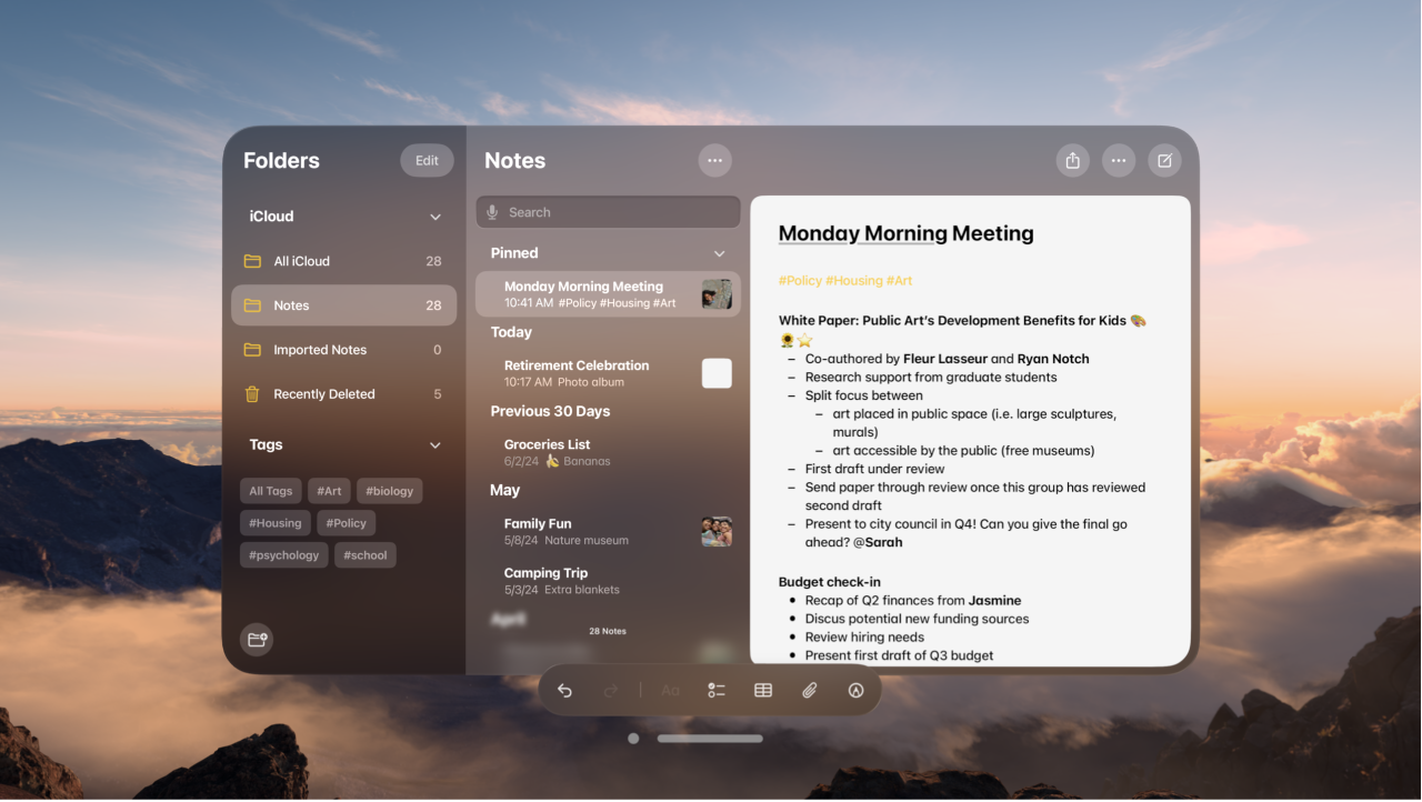 A user’s view on Apple Vision Pro. An app window is visible, and an Environment is showing in the background.