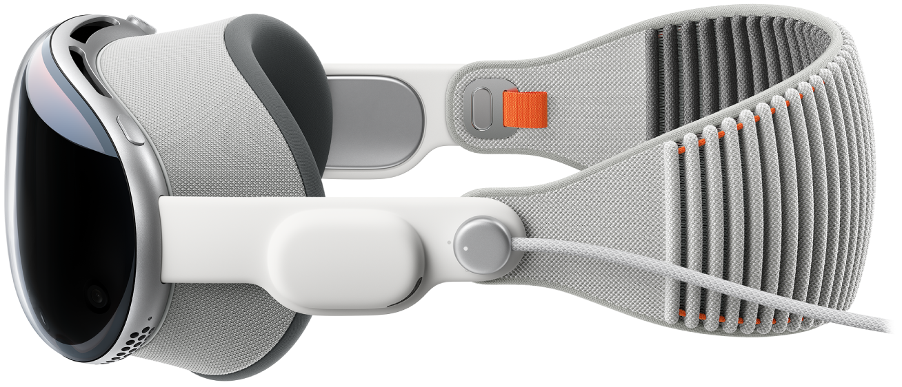 Vista lateral del Apple Vision Pro con la batería conectada.