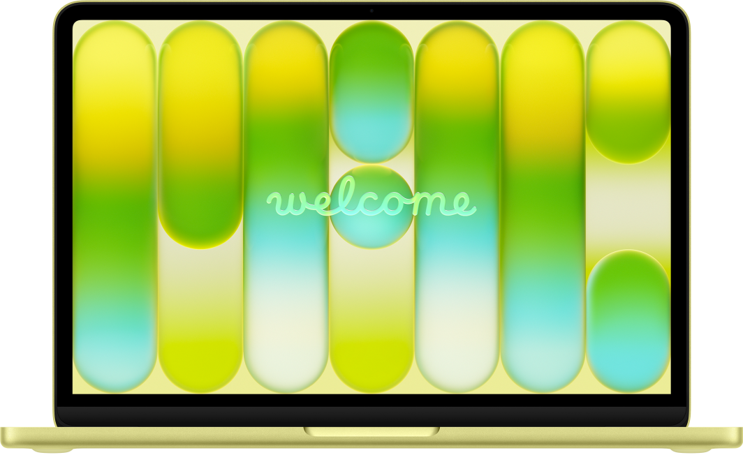 Atidarytas „MacBook Neo“. Ekrane matomas žodis „Welcome“ (sveiki).