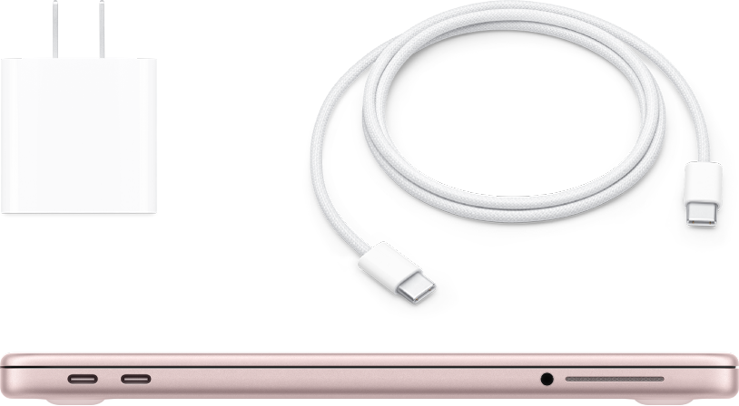 Закрытый MacBook&nbsp;Neo с&nbsp;адаптером питания и&nbsp;кабелем зарядки.