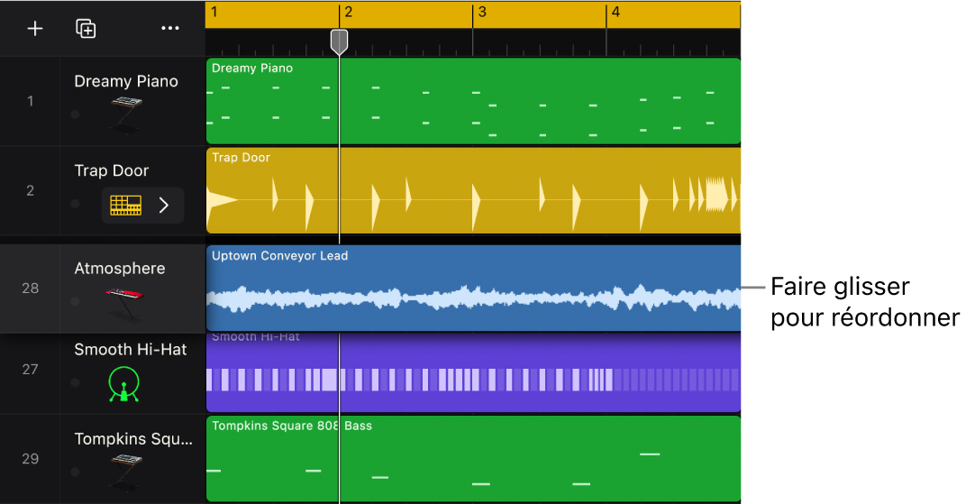 Figure. Zone Pistes montrant le glissement d’une piste audio sur une piste d'instrument.