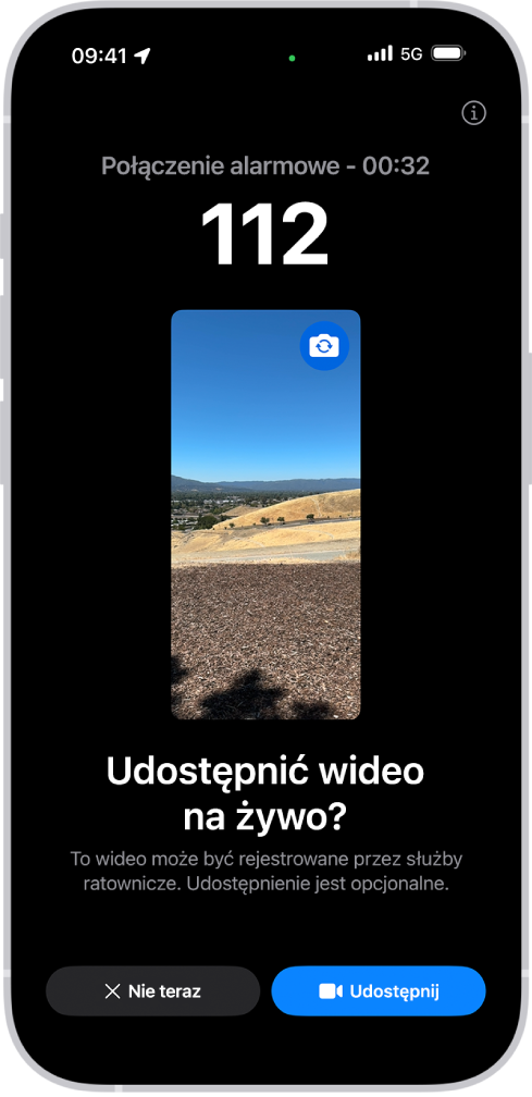 Ekran Wideo na żywo (alarmowe SOS) pokazujący połączenie alarmowe pod numer 911 z podglądem wideo w środku. Na dole znajdują są przyciski: Nie teraz i Udostępnij wideo.