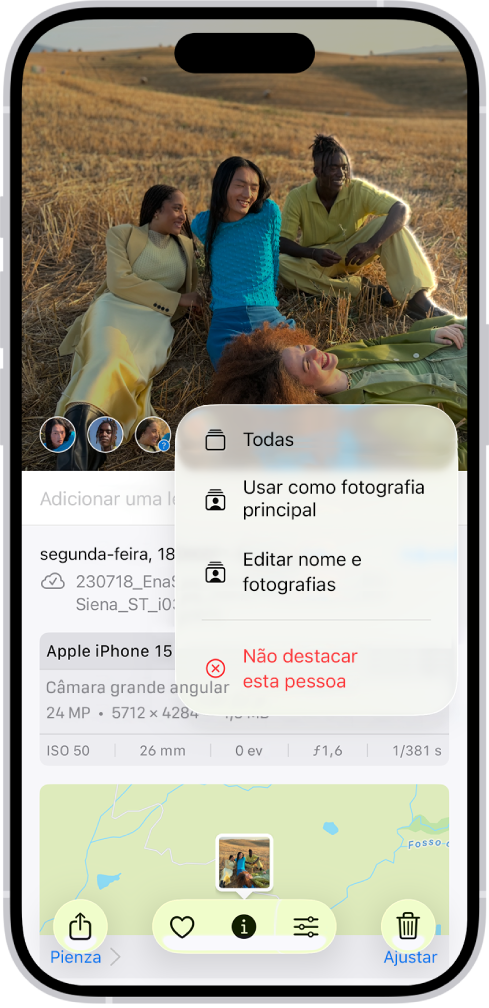 A metade superior do ecrã do iPhone mostra uma fotografia aberta na aplicação Fotografias. No canto inferior esquerdo do ecrã da fotografia estão os rostos das pessoas que aparecem na fotografia. Um dos rostos tem um ponto de interrogação junto a ele. Um menu de opções inclui, de cima para baixo, “Todas as fotografias”, “Usar como fotografia principal”, “Editar nome e fotografias” e “Não destacar esta pessoa”.