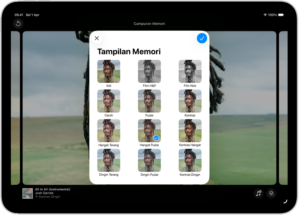 Film memori diputar dan di bagian tengah layar terdapat pilihan untuk menerapkan Tampilan Memori.