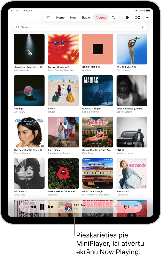 Library Recently Added ekrāns, kura apakšā ir redzams MiniPlayer. MiniPlayer parāda dziesmas nosaukumu, kas tiek atskaņota. Pogas Pause un Next Track atrodas pa labi no dziesmas nosaukuma.