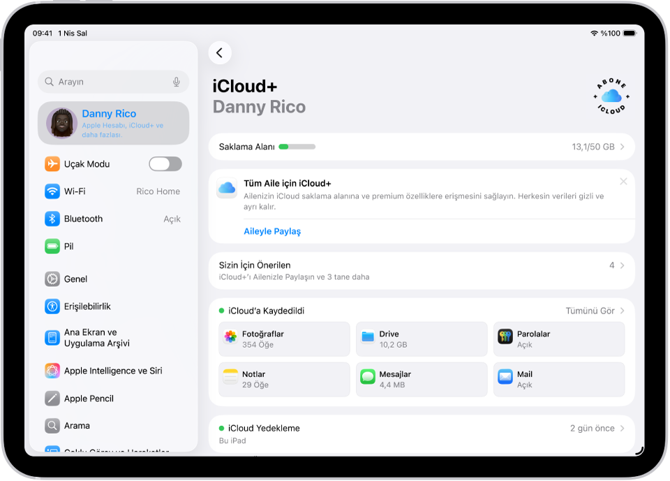 iCloud saklama alanı göstergesinin ve Fotoğraflar, iCloud Drive ve iCloud Mail de dahil olmak üzere iCloud ile kullanılabilecek uygulamaların ve özelliklerin bir listesinin gösterildiği iCloud ayarları ekranı.