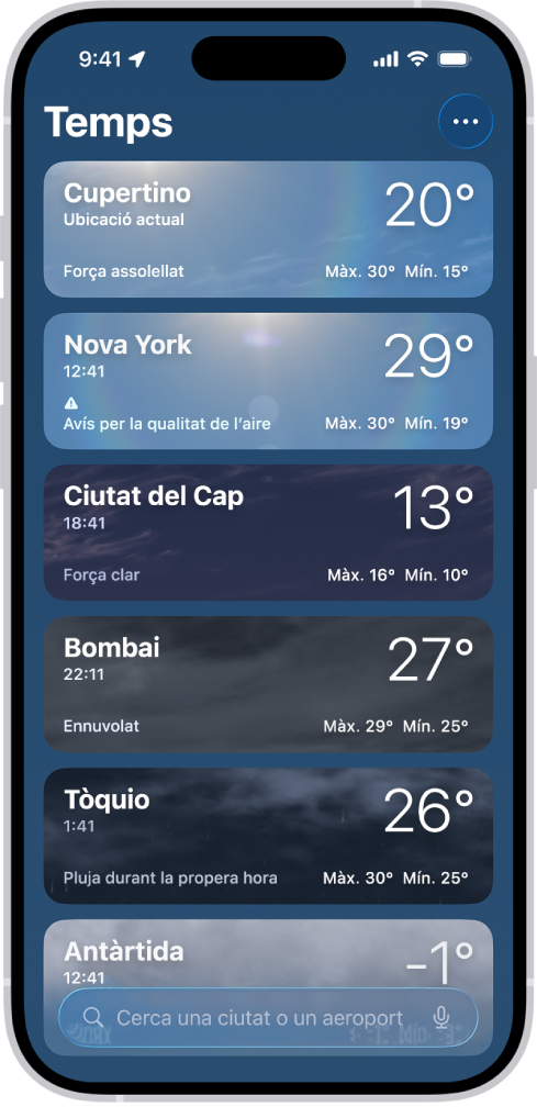 L’app Temps mostrant una llista de ciutats amb l’hora actual, la temperatura, la previsió meteorològica i les temperatures màxima i mínima. A la part inferior de la pantalla hi ha el camp de cerca, i a l’angle superior dret hi ha el botó “Més”.