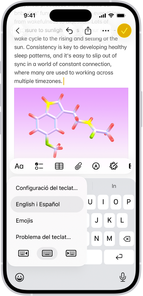 El menú de la configuració del teclat està obert, i s’hi mostren diverses opcions de teclat: “Anglès”, “Espanyol”, “Emojis” i “Resposta del teclat”.