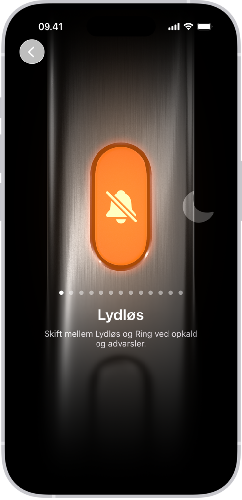 Skærmen til tilpasning af knappen Handling. Kameraet er den valgte handling. Andre funktioner vises til højre og venstre for kameraet, herunder Forstyr ikke og Lommelygte. Under handlingerne er der prikker, som du kan trykke på for at skifte til en anden handling. Under den valgte handling, Kamera, er der en menu med kameraindstillinger, som du kan trykke på for at tildele dem til knappen Handling.