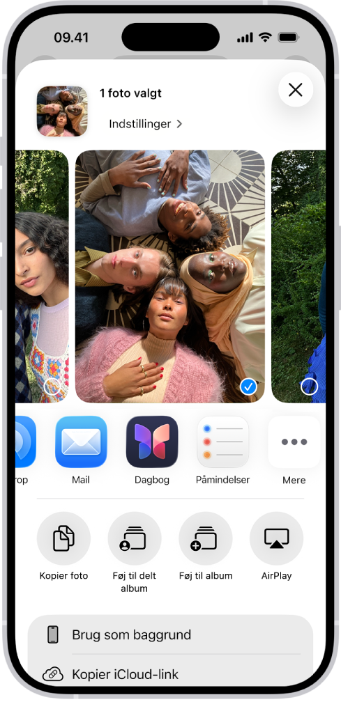 Skærmen til at dele et foto med indstillingerne til deling lige under det åbne foto samt knappen Mere til at redigere indstillingerne til deling.