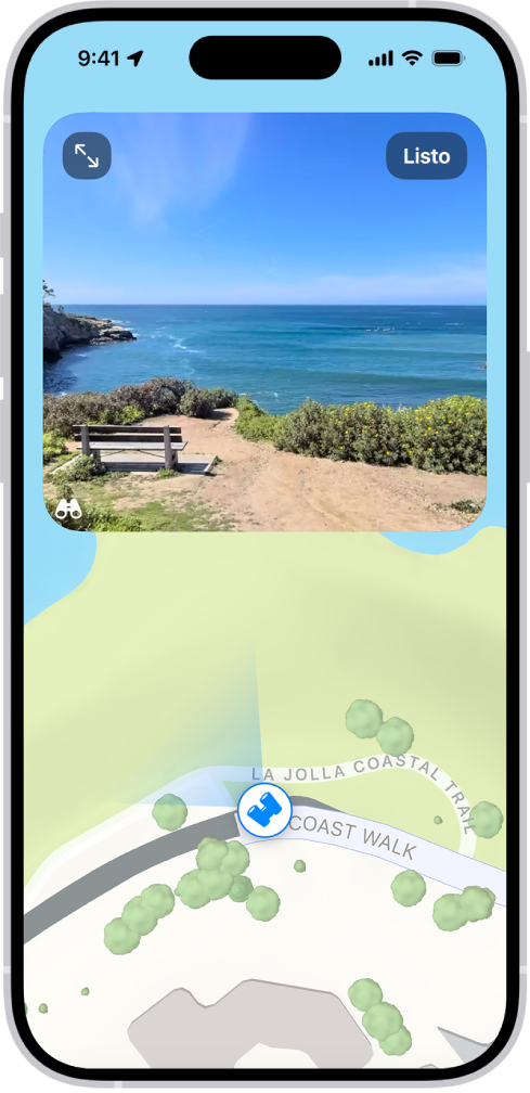 En la app Mapas, se muestra una vista panorámica desplazable de 360 grados sobre el mapa de una zona marcada. El ícono Mirar alrededor superpuesto en el mapa apunta en la dirección de la vista.