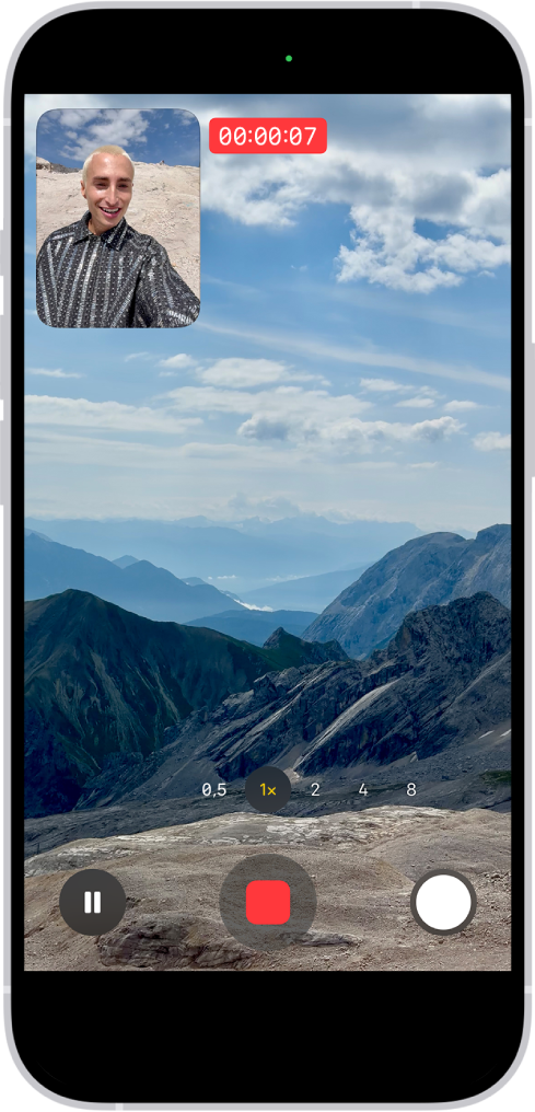 La caméra en mode Vidéo enregistrant une vidéo Double capture. Une fenêtre en haut à gauche du cadre affiche ce que la caméra avant est en train d’enregistrer et le reste du cadre affiche ce que la caméra arrière est en train d’enregistrer.