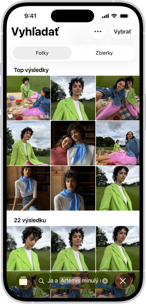 iPhone s fotkami v apke Fotky. V dolnej časti obrazovky je vyhľadávacia lišta s popisom.