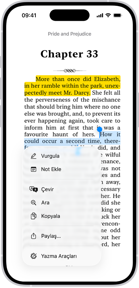Kitaplar uygulamasında bir kitap sayfası, sayfadaki metnin bir bölümü seçili. Vurgula, Not Ekle ve Çeviri denetimleri seçili metnin üstündedir.