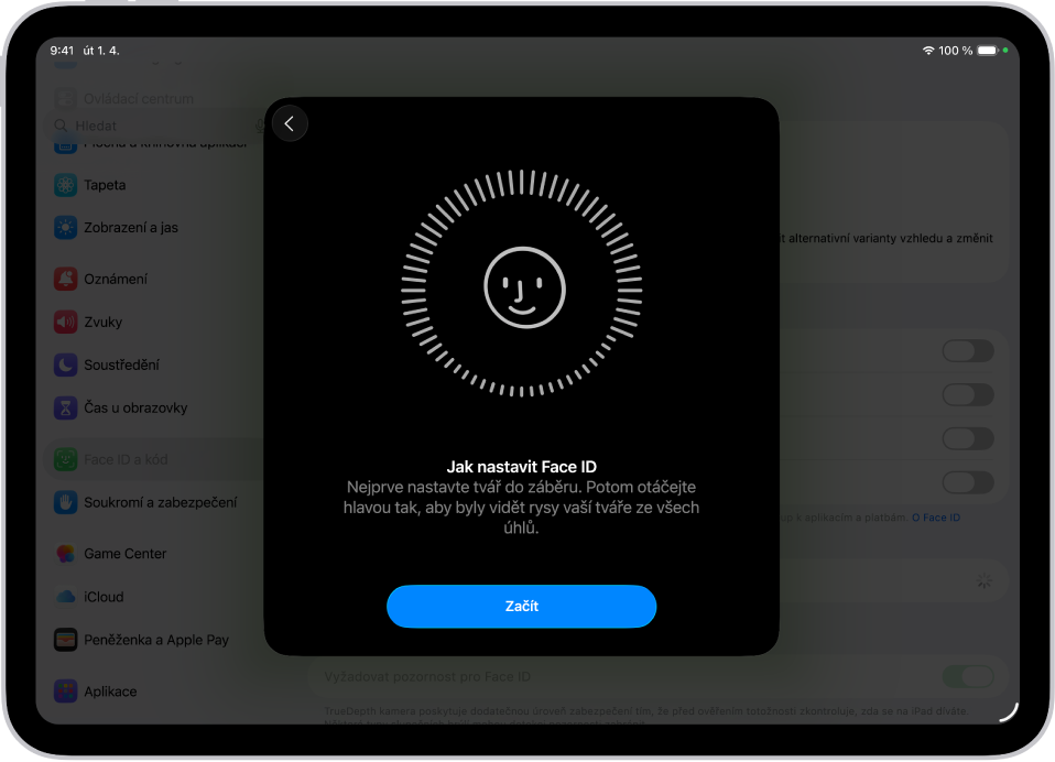 Obrazovka nastavení rozpoznávání Face ID. Na displeji je vidět smajlík v kruhu. Text pod ním žádá uživatele, aby pomalým pohybem hlavy opsal celý obvod kruhu. U dolního okraje displeje je vidět tlačítko Začít.