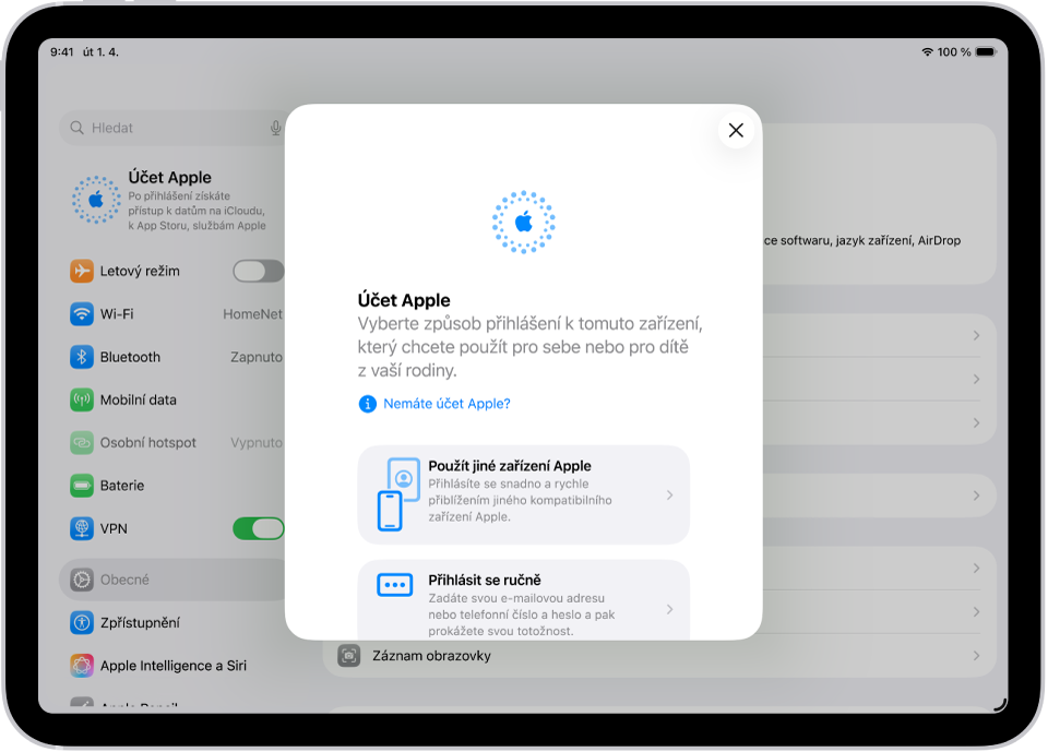 Obrazovka Nastavení, na které se uprostřed zobrazuje dialogové okno přihlášení k účtu Apple