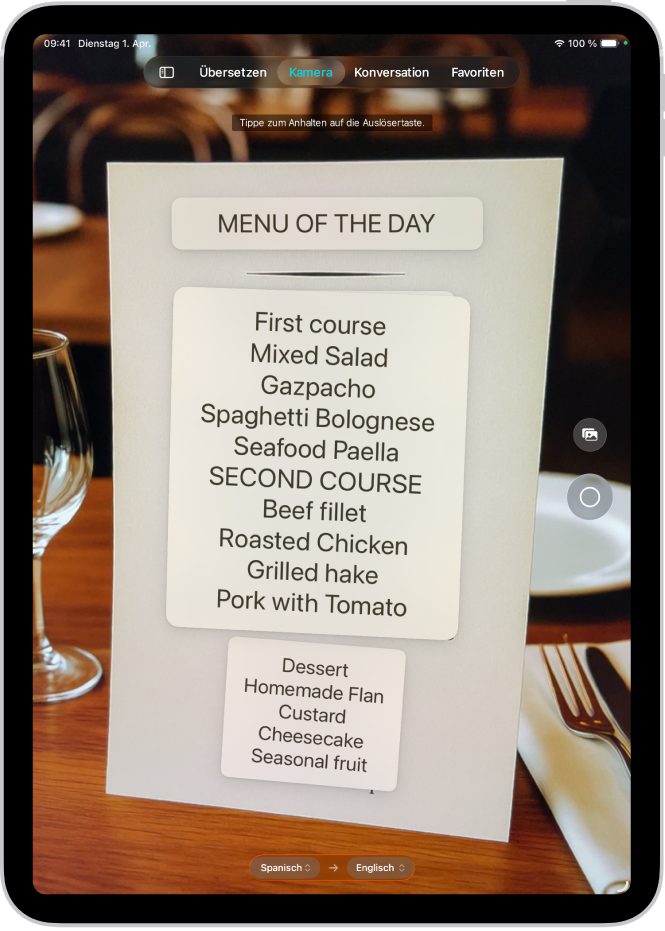 Der Bildschirm „Kamera“ zeigt eine Speisekarte in einem Restaurant mit Text, der aus dem Spanischen ins Englische übersetzt wurde.