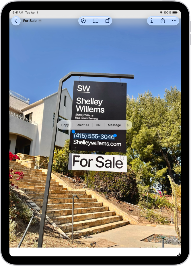 A photo of a real estate sign, with the phone number highlighted. Above the phone number are the Call, Message, Add to Contacts, and Copy options.