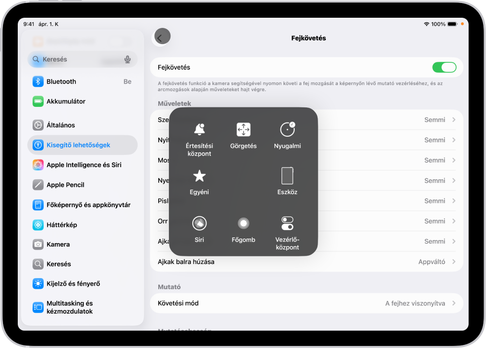 Egy iPad, amelyen a fejkövetés be van kapcsolva. Az AssistiveTouch menüje látható, amelyben az Értesítési központ, a Görgetés, a Nyugalmi, az Eszköz, a Vezérlőközpont, a Főképernyő, a Siri és az Egyéni szakasz vezérlői láthatók.