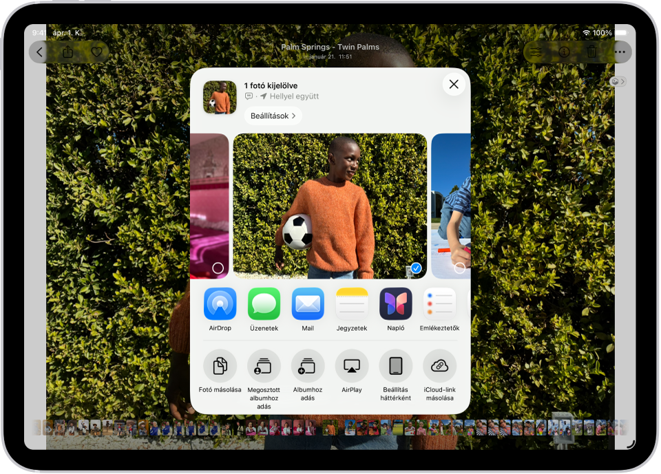 Egy fotó van megnyitva a Fotók appban, a képernyő közepén pedig a megosztási lehetőségek láthatók.