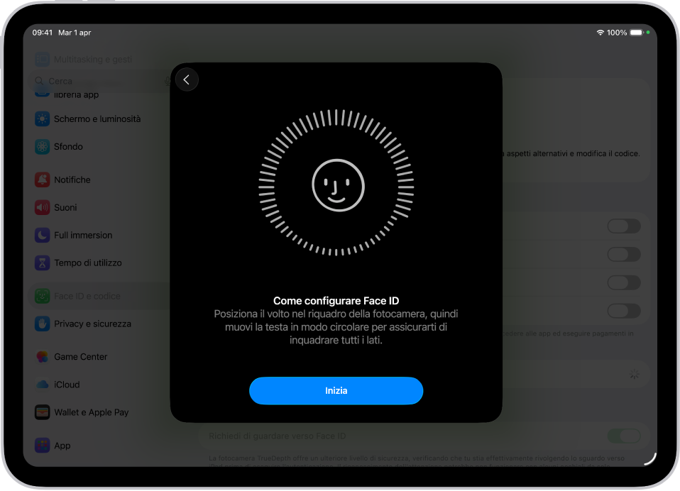 La schermata di configurazione del riconoscimento di Face ID. Sullo schermo è visibile un volto sorridente, circondato da un cerchio. Il testo sotto di esso indica all’utente di muovere la testa lentamente in modo da tracciare un cerchio completo. Il pulsante Inizia è vicino alla parte inferiore dello schermo.