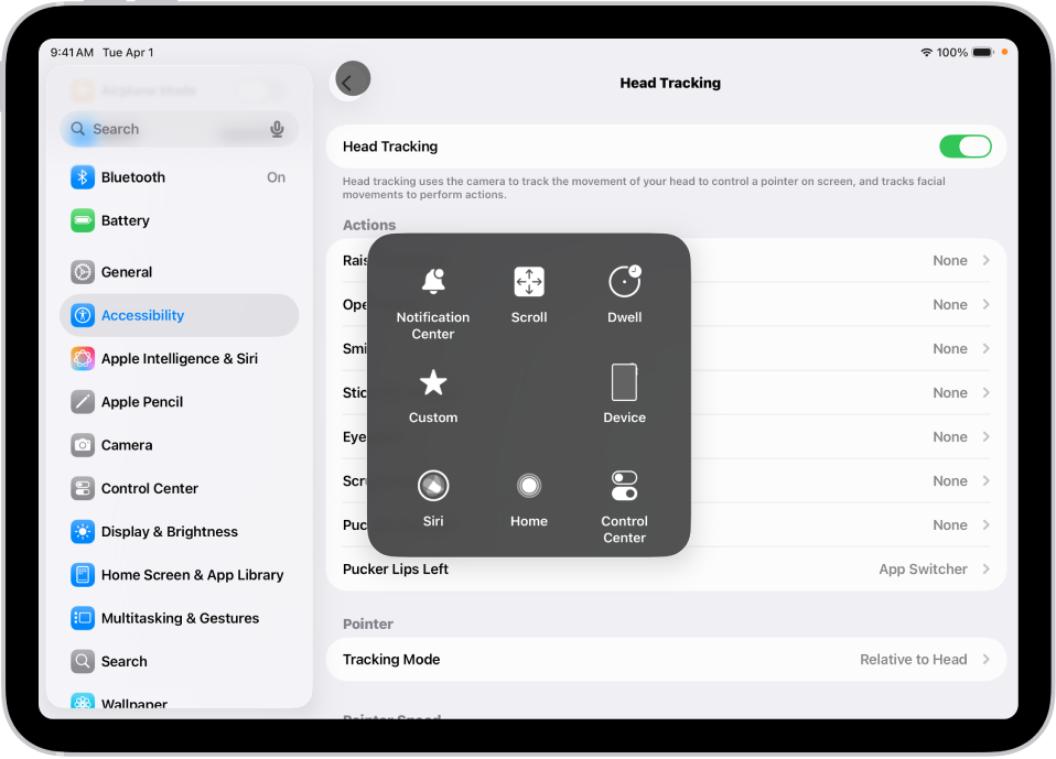iPad dengan penjejakan kepala diaktifkan. Menu AssistiveTouch kelihatan, menunjukkan kawalan untuk Pusat Pemberitahuan, Skrol, Inap, Peranti, Pusat Kawalan, Utama, Siri dan Tersuai.