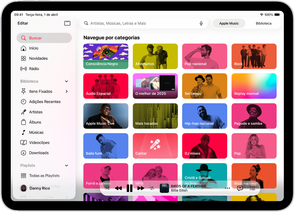 Aba Buscar mostrando a barra lateral na esquerda e um campo de busca na parte superior direita. Abaixo do campo de busca, há diversas categorias de músicas. O Minirreprodutor encontra-se na parte inferior.