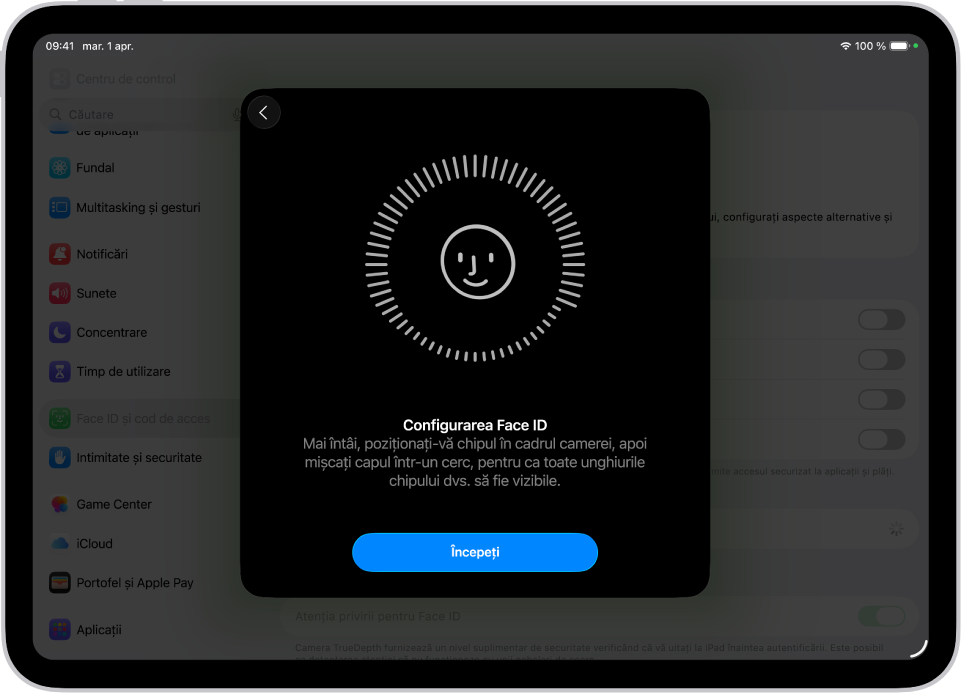 Ecranul de configurare a recunoașterii Face ID. O față zâmbitoare este afișată pe ecran, încadrată într-un cerc. Textul de sub aceasta instruiește utilizatorul să-și miște încet capul pentru a finaliza cercul. Butonul Începeți apare în apropierea părții de jos a ecranului.
