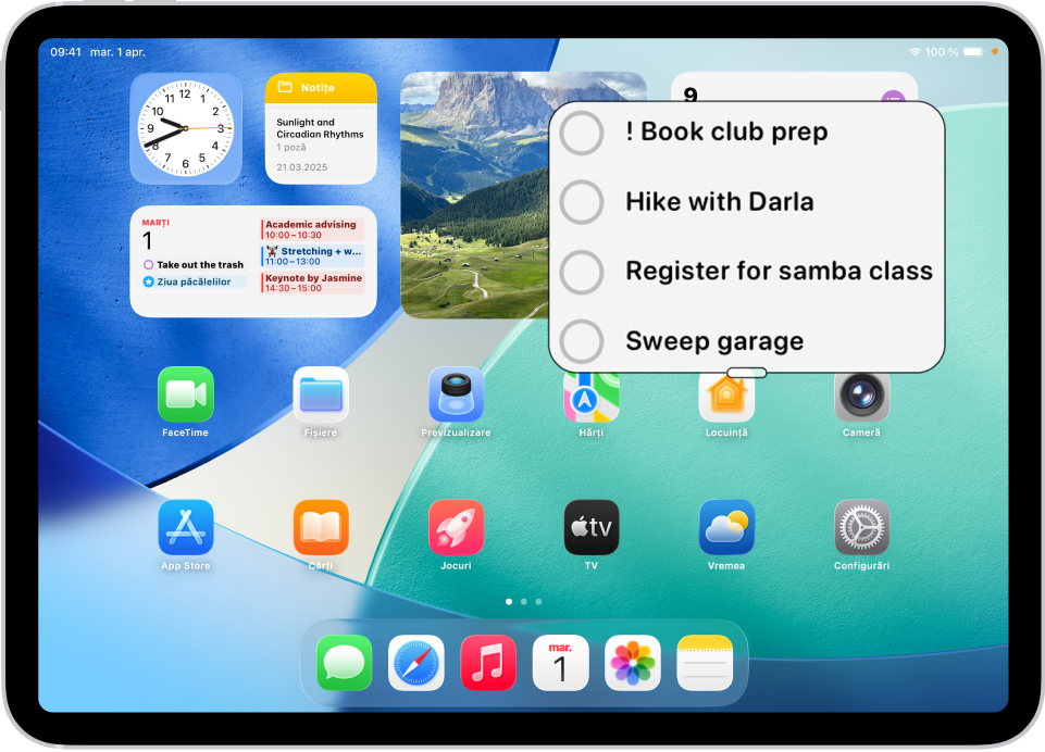 Un iPad afișând ecranul principal cu o fereastră în care s-a efectuat zoom înainte pe o porțiune a ecranului.
