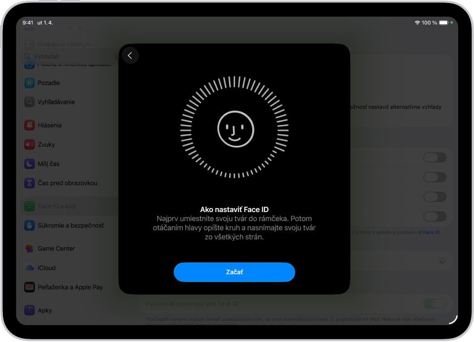 Obrazovka nastavenia rozpoznávania funkciou Face ID. Na obrazovke je smajlík v kruhu. Text pod ním žiada užívateľa, aby pomalým pohybom hlavy opísal celý obvod kruhu. V dolnej časti obrazovky sa nachádza možnosť Začíname.