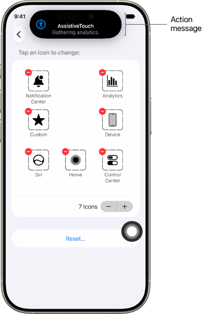 An iPhone with a label identifying the “AssistiveTouch Gathering analytics” message at the top of the screen.