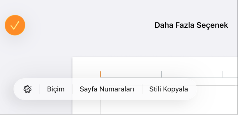 Ortada ekleme noktası ile üç üst bilgi alanı ve Sayfa Numaları’nı gösteren açılır menü.