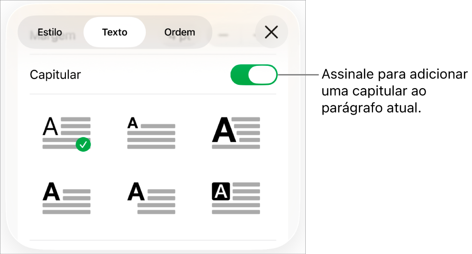 Os controlos de "Capitular” no menu “Texto”.