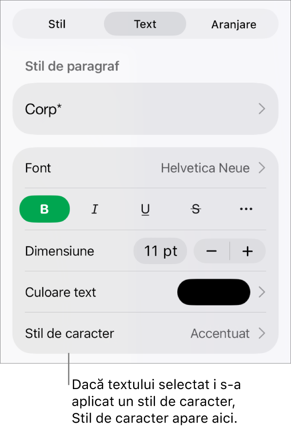 Comenzile de formatare Text cu Stil de caracter sub comenzile Culoare. Stilul de caracter Nimic apare cu un asterisc.