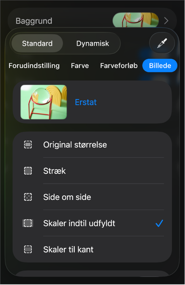 Betjeningsmulighederne til baggrund med et billede indstillet som lysbilledbaggrund og betjeningsmulighederne til Farveoverligger nederst.