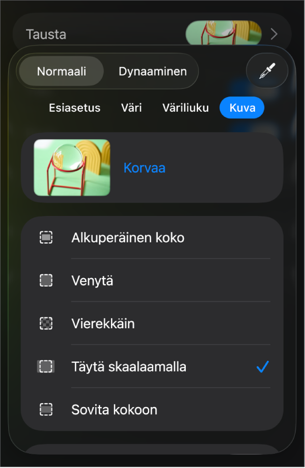 Tausta-säätimet, joissa kuva on asetettu dian taustaksi, ja Värin täyttö -säädin näkyy alareunassa.