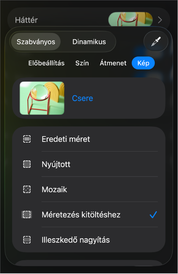 A Háttér vezérlők, egy, a dia háttereként beállított képpel, és az alul megjelenő Színfedvény vezérlővel.