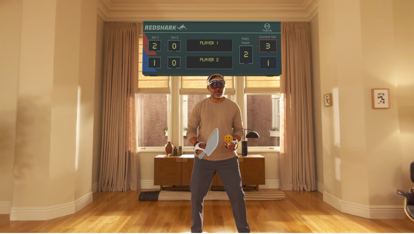 A person playing a game in Apple Arcade on Apple Vision Pro, using a connected controller.